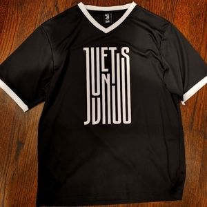 Official Juventus soccer team warm up jersey.